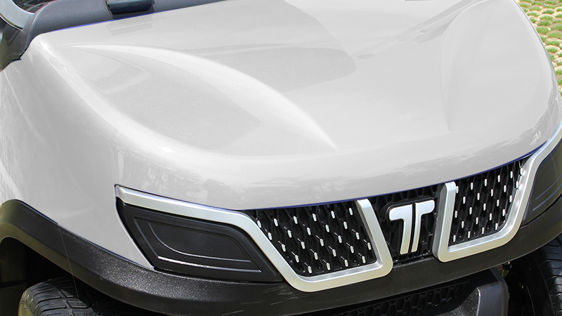 Close-up of Tara golf cart front end showcasing aerodynamic styling and sturdy construction for enhanced performance