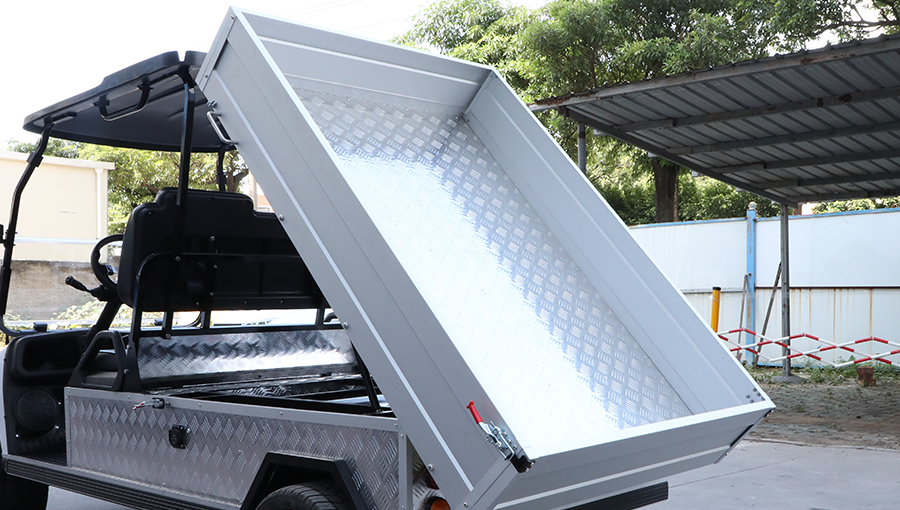 Rear cargo box of Tara Turfman utility vehicle, designed for carrying tools, equipment, and supplies