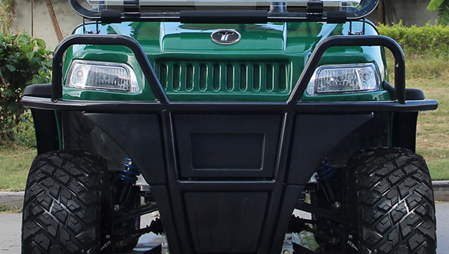 Close-up of the heavy-duty front bumper on Tara Turfman 700, designed to protect the vehicle during rugged use