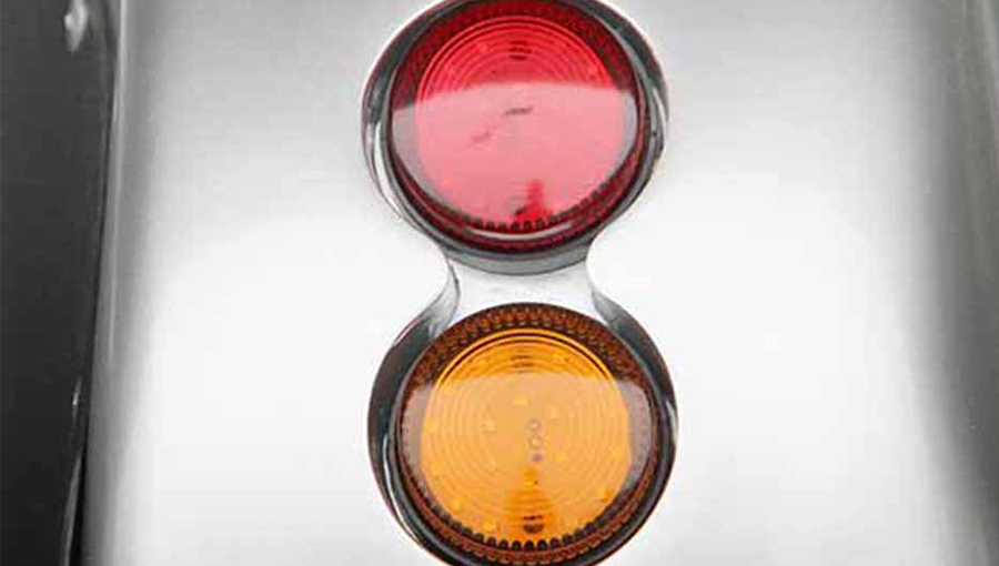 Close-up of Tara golf cart LED taillights, providing clear brake and turn signal indicators

