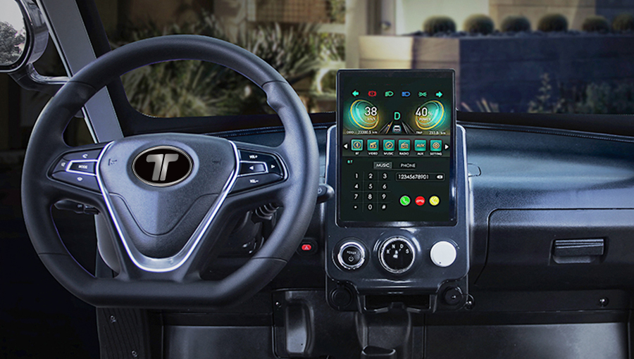 Close-up of Tara T3 2+2 golf cart dashboard featuring a responsive touchscreen display and ergonomic control switches