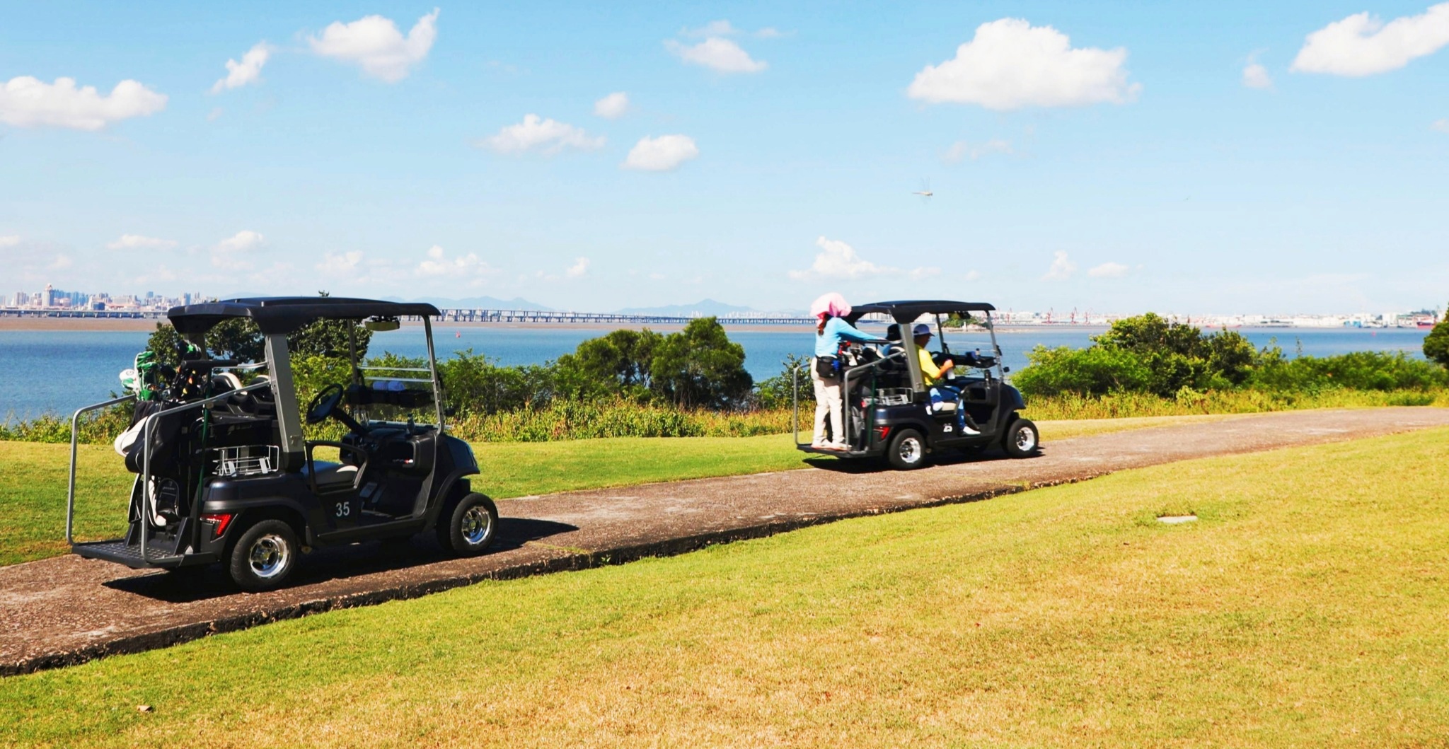 Tara Harmony Golf Cart Driving on Golf Course