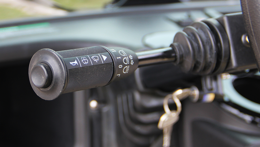 Close-up of approved switches on Tara golf cart dashboard, designed for secure and compliant operation